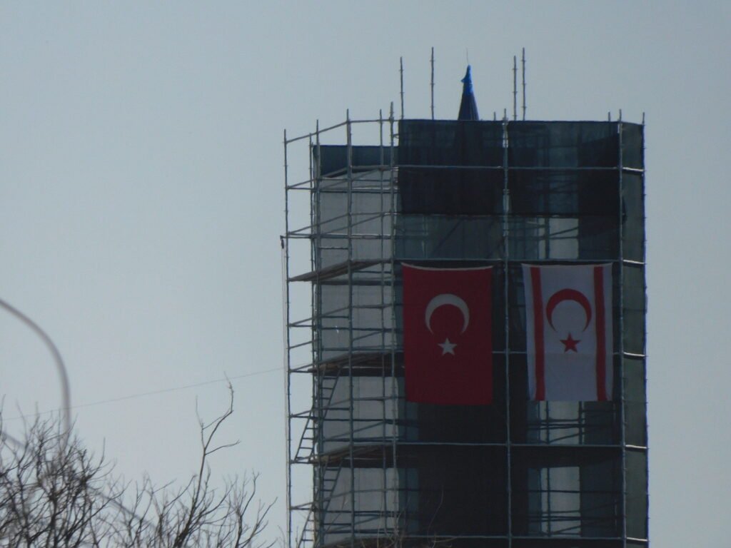 Flags of Turkey and Turkish Republic of Northern Cyprus respectively, hanging on a building in Nicosia. 