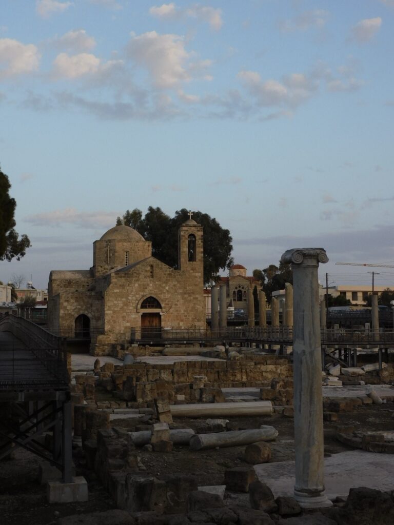 Old church in Paphos with ancient Roman ruins in the foreground.