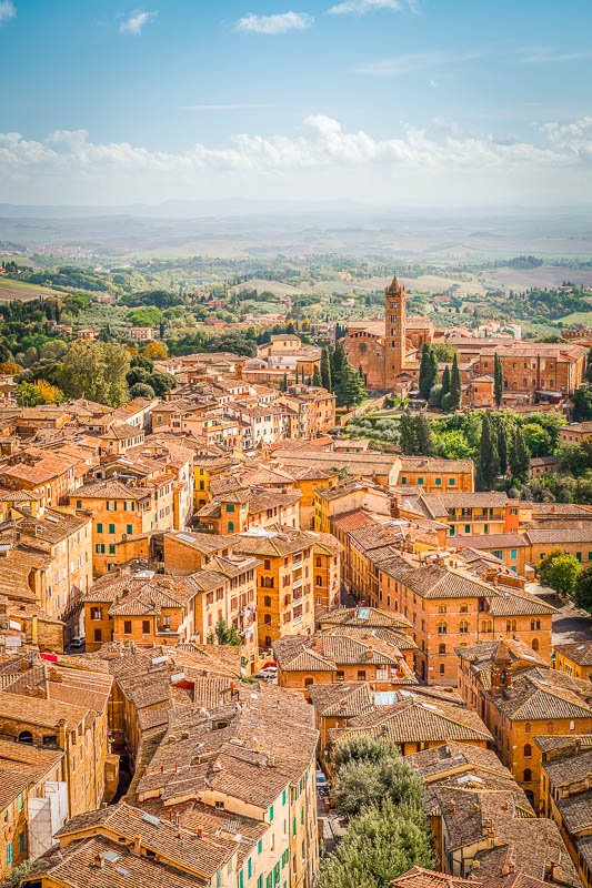 Stay in a medieval Tuscan town with views of vineyards.