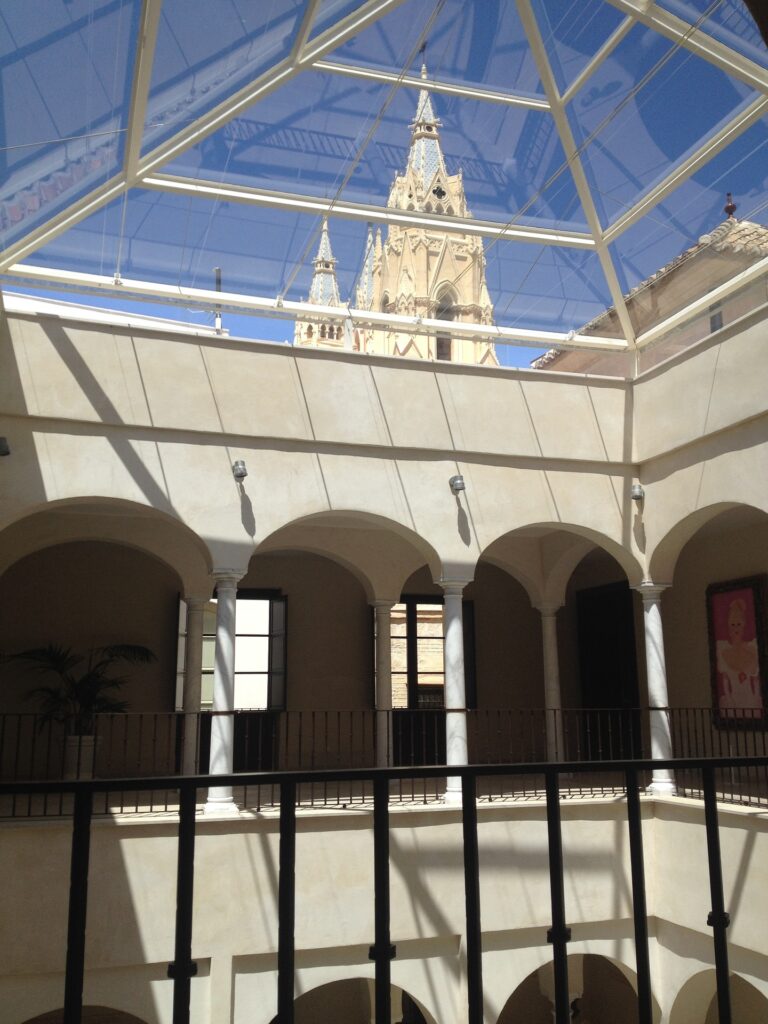 View of windows from the inside of the Carmen Thyssen museum in Malaga. This is among the top things to do in the Costa del Sol, hands down.