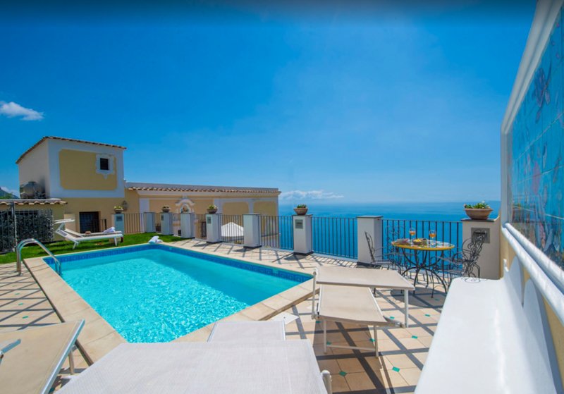 Swim in the outdoor pool on the sea-view terrace of this villa in Italy.